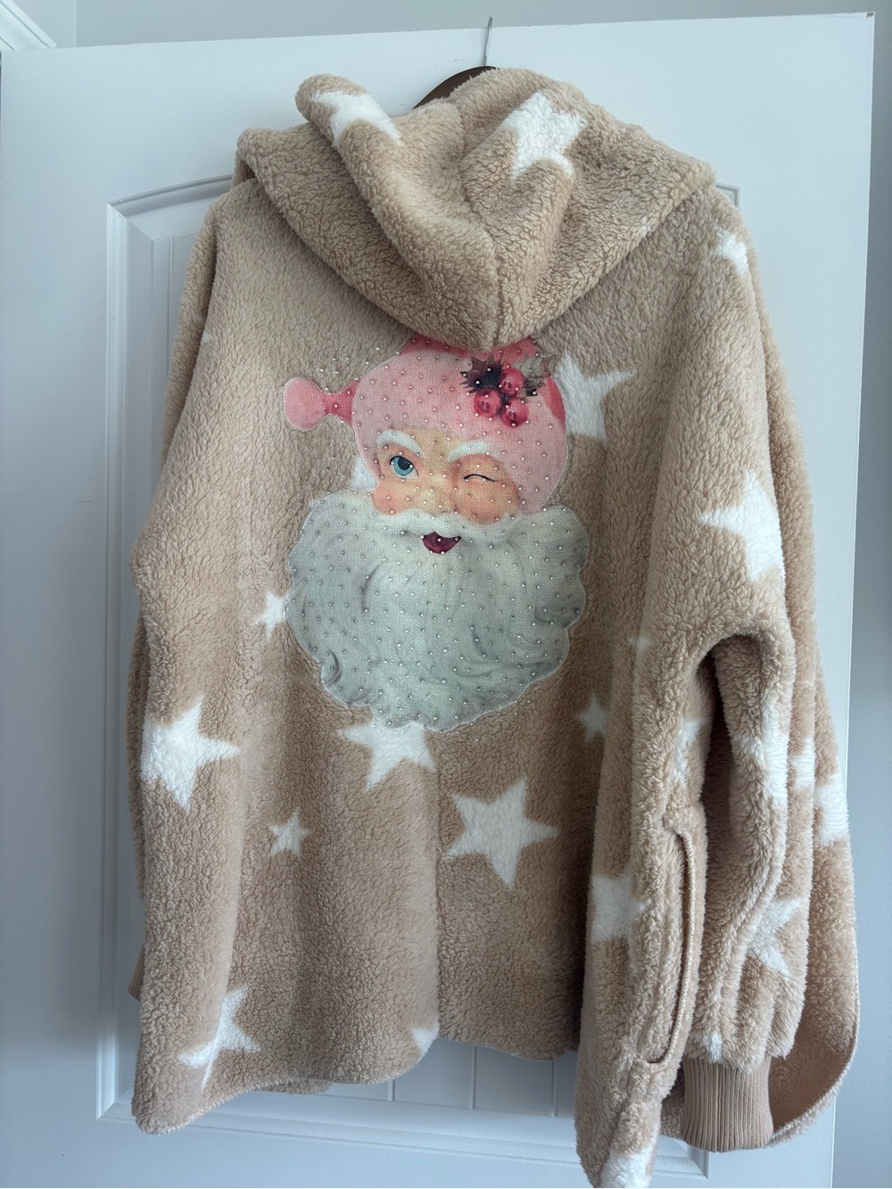 Judith March Beige Sherpa Hoodie with White Stars and Festive Winking Graphic